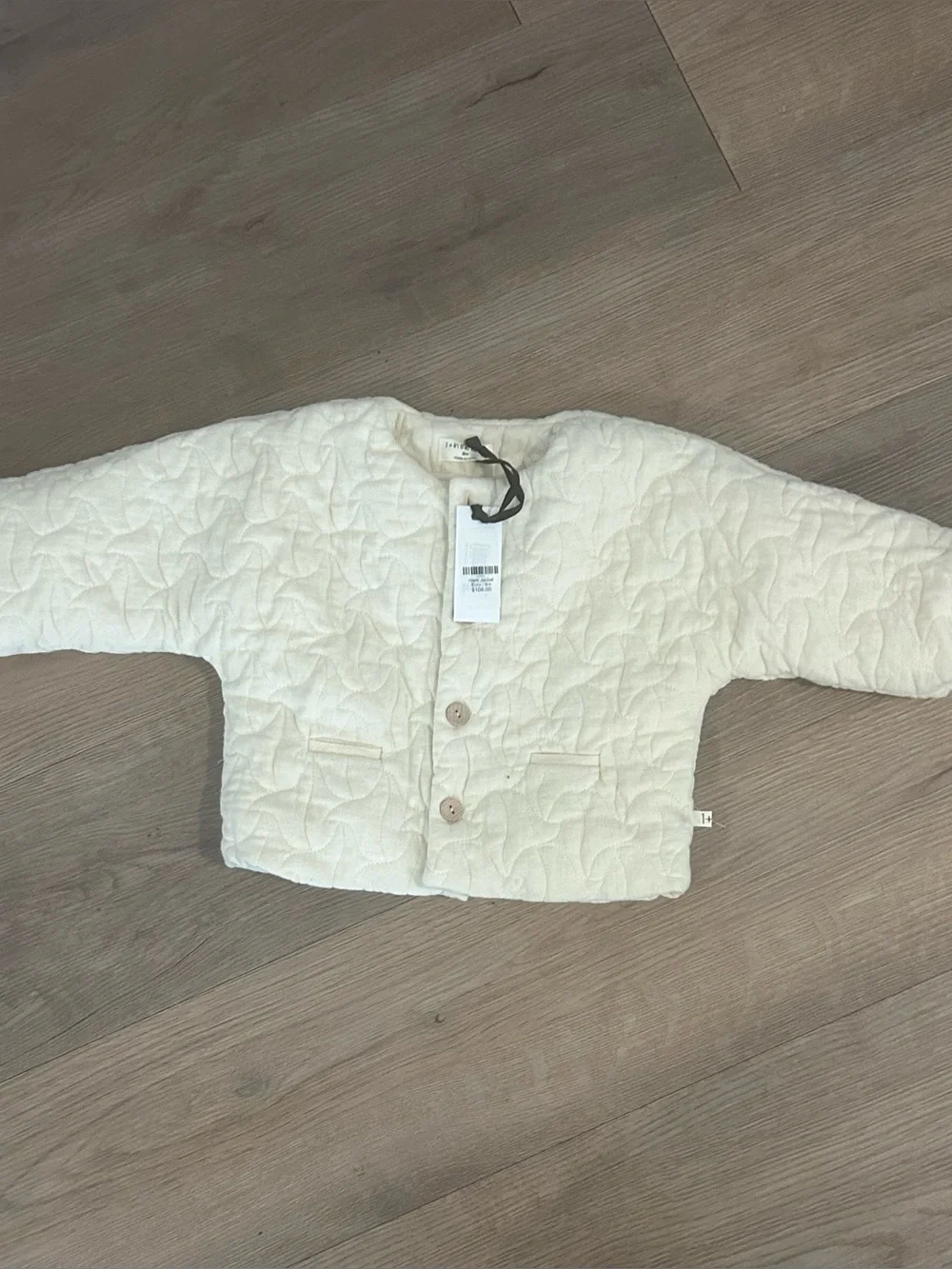 Cream Quilted Button-Front baby jacket